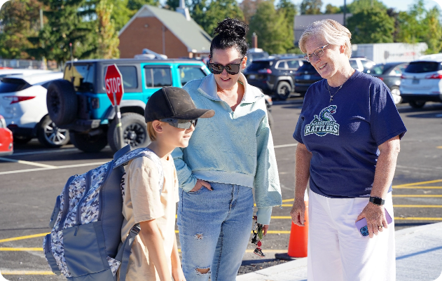Parent dropping off student at school