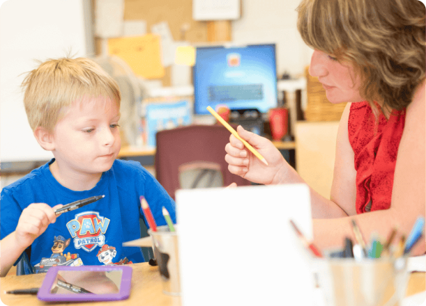 Teacher and Child in a Classroom
