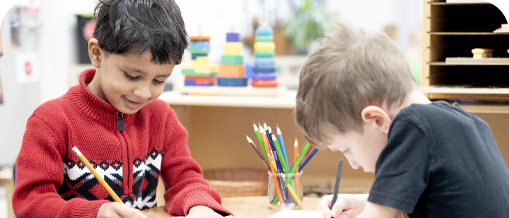 Students drawing together in a classroom