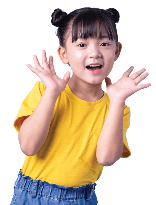 A student smiling in a yellow shirt